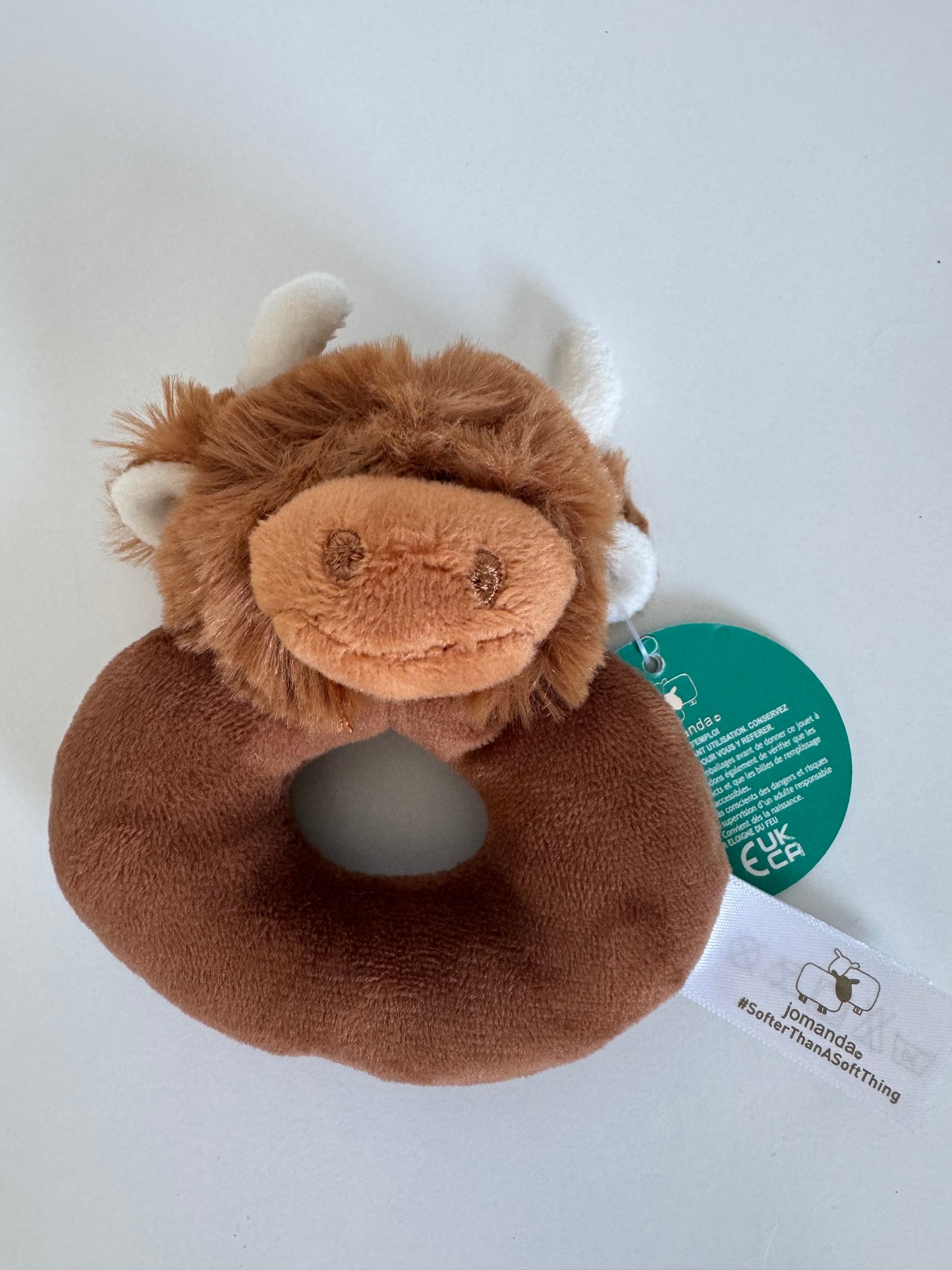 Brown highland baby rattle