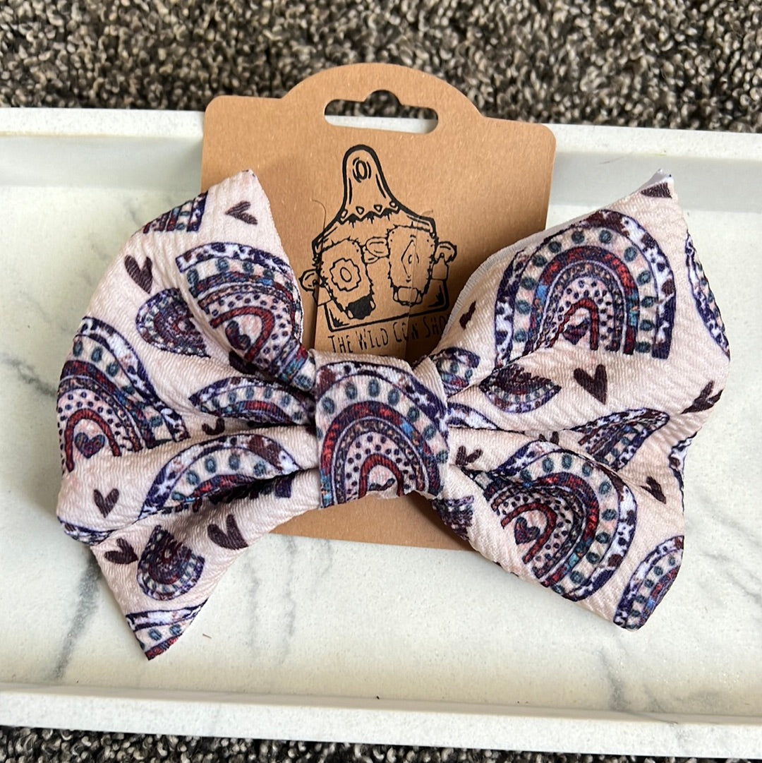 Cow print rainbows hair bow