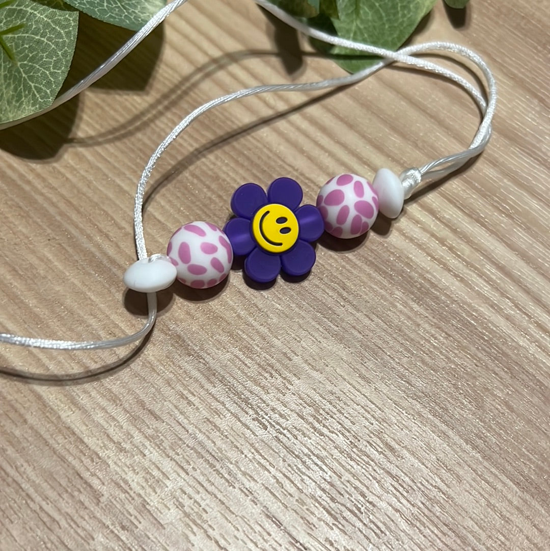 Purple Smiley Flower