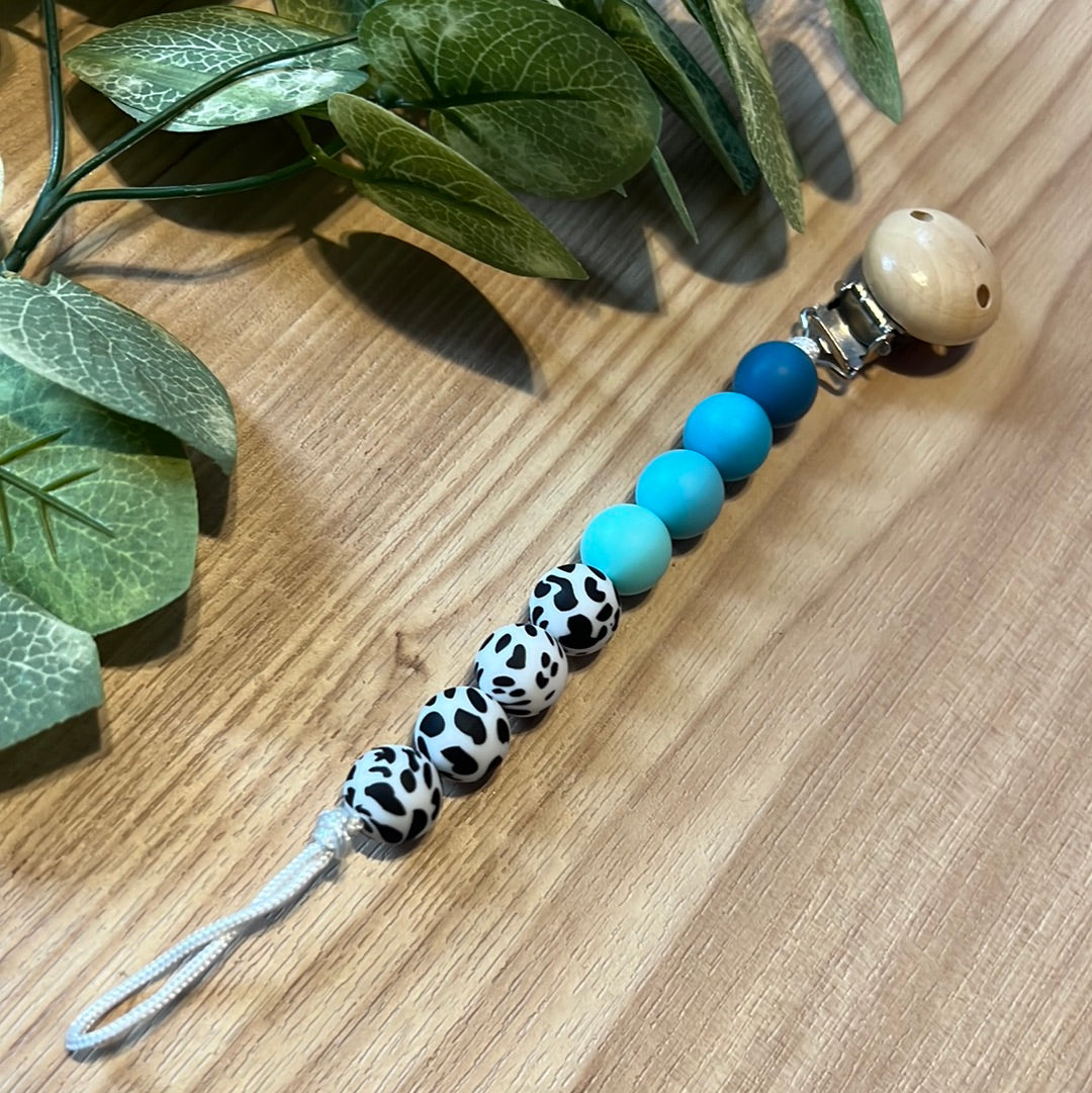 Blue CowPrint Pacifier clip